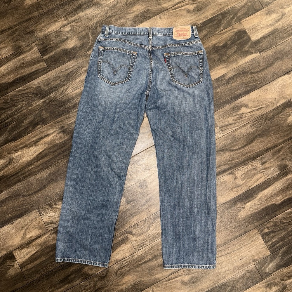 Vintage Levi's 559 Relaxed Fit Straight Leg Medium Wash Denim Jeans Men's 34x32